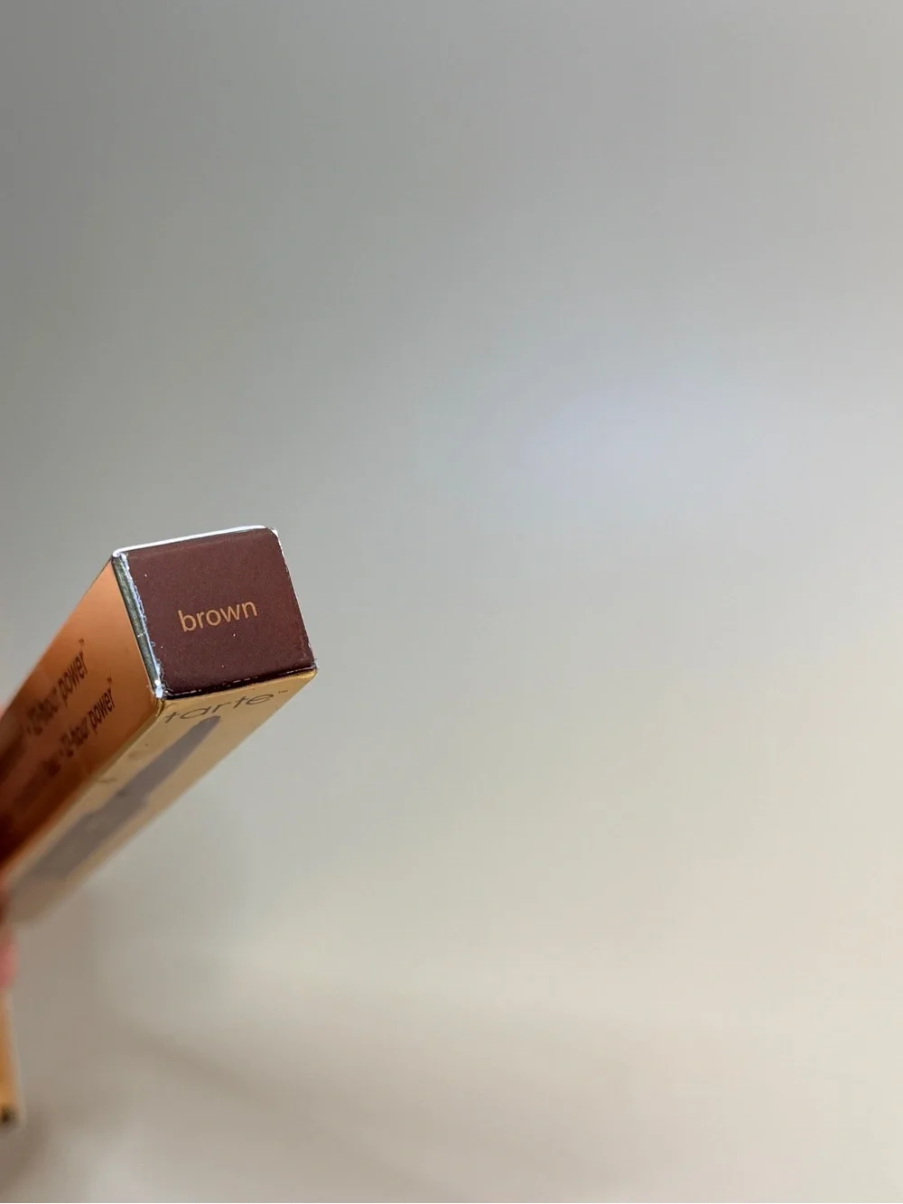 tarte Maneater Retractable Eyeliner Pencil in Deep Brown with Gold Accents